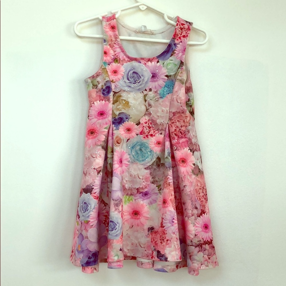 Adorable dress flower imagery and rhinestones